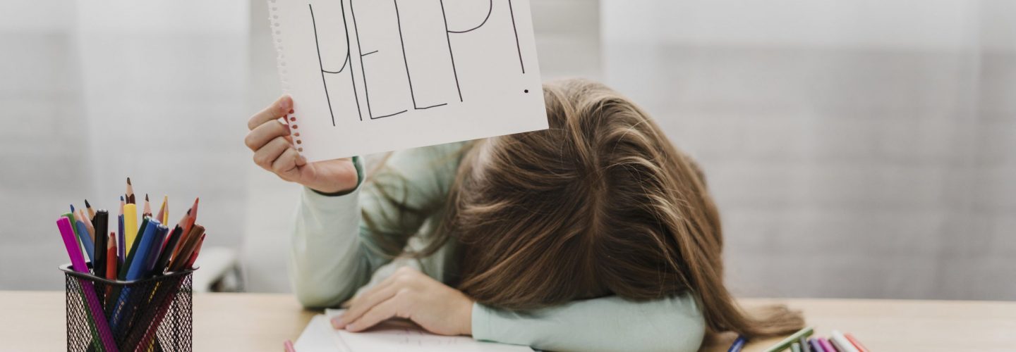 little-girl-holding-help-message-white-paper