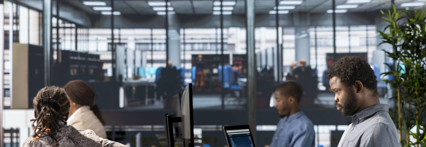 Successful african american employee manages financial planning and project development for expansion goals. Male analyst using his expertise to meet business objectives, administrative tasks.